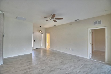 Welcome to this beautifully updated 2-bedroom, 2-bathroom home on Lake Ashton Golf Club in Florida - for sale on GolfHomes.com, golf home, golf lot