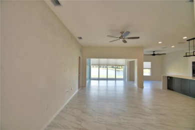 Welcome to this beautifully updated 2-bedroom, 2-bathroom home on Lake Ashton Golf Club in Florida - for sale on GolfHomes.com, golf home, golf lot