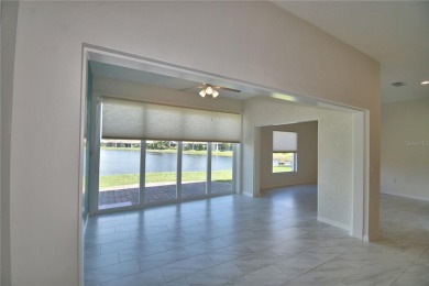 Welcome to this beautifully updated 2-bedroom, 2-bathroom home on Lake Ashton Golf Club in Florida - for sale on GolfHomes.com, golf home, golf lot