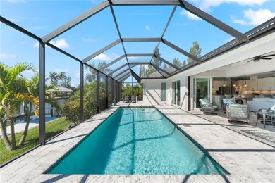 Live the Florida Dream! This stunning custom-built waterfront on Rotonda Golf and Country Club - Long Marsh  in Florida - for sale on GolfHomes.com, golf home, golf lot