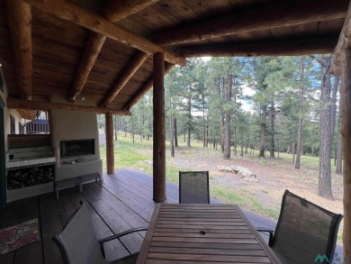 Wake up to fresh mountain air, peaceful pines, and the beauty of on Pendaries Village Community Assoc. in New Mexico - for sale on GolfHomes.com, golf home, golf lot
