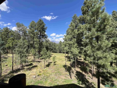 Wake up to fresh mountain air, peaceful pines, and the beauty of on Pendaries Village Community Assoc. in New Mexico - for sale on GolfHomes.com, golf home, golf lot