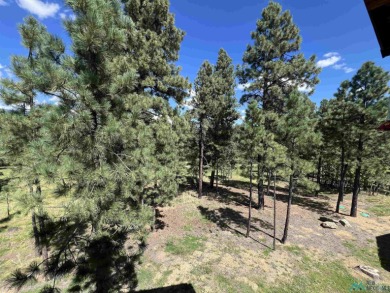 Wake up to fresh mountain air, peaceful pines, and the beauty of on Pendaries Village Community Assoc. in New Mexico - for sale on GolfHomes.com, golf home, golf lot