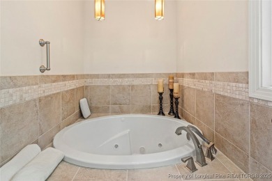 This brick beauty is now available. Located in the gated and on Carolina Trace Country Club in North Carolina - for sale on GolfHomes.com, golf home, golf lot