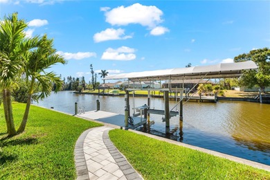 Live the Florida Dream! This stunning custom-built waterfront on Rotonda Golf and Country Club - Long Marsh  in Florida - for sale on GolfHomes.com, golf home, golf lot