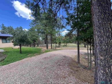 Wake up to fresh mountain air, peaceful pines, and the beauty of on Pendaries Village Community Assoc. in New Mexico - for sale on GolfHomes.com, golf home, golf lot