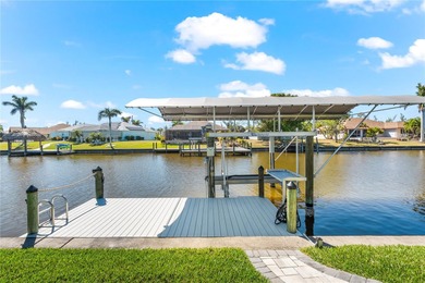 Live the Florida Dream! This stunning custom-built waterfront on Rotonda Golf and Country Club - Long Marsh  in Florida - for sale on GolfHomes.com, golf home, golf lot