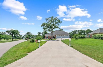 Stunning custom home on .72 acres surrounded by beautiful golf on Cedar Creek Country Club in Texas - for sale on GolfHomes.com, golf home, golf lot