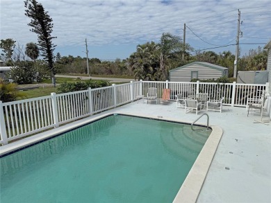 Spacious WATERFRONT Gulf access 2005 manufactured home located on Saint Andrews South Golf Club in Florida - for sale on GolfHomes.com, golf home, golf lot