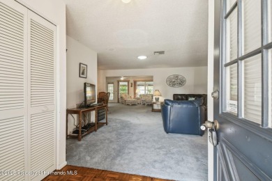 Don't miss this well-maintained Oakmont model featuring 2 on Timber Pines Golf Course in Florida - for sale on GolfHomes.com, golf home, golf lot