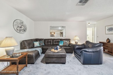 Don't miss this well-maintained Oakmont model featuring 2 on Timber Pines Golf Course in Florida - for sale on GolfHomes.com, golf home, golf lot