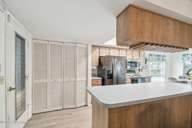 Don't miss this well-maintained Oakmont model featuring 2 on Timber Pines Golf Course in Florida - for sale on GolfHomes.com, golf home, golf lot