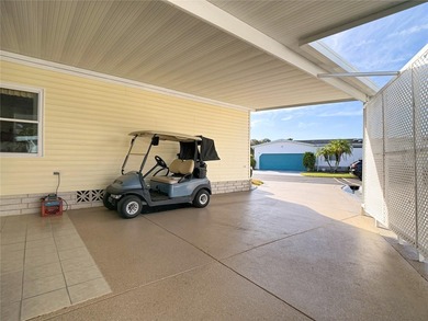 Turnkey 2/2 with Canal & Golf Course Views -- Live Where You on Lily Lake Golf and RV Resort in Florida - for sale on GolfHomes.com, golf home, golf lot