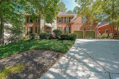 Welcome home to this beautiful 3-sided brick home situated on on Brookstone Golf and Country Club in Georgia - for sale on GolfHomes.com, golf home, golf lot