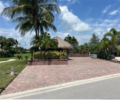 Welcome to this tropical sanctuary, where luxury and attention on St. Lucie Trail Golf Club in Florida - for sale on GolfHomes.com, golf home, golf lot