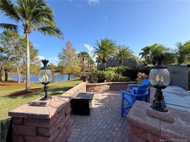 Welcome to this tropical sanctuary, where luxury and attention on St. Lucie Trail Golf Club in Florida - for sale on GolfHomes.com, golf home, golf lot