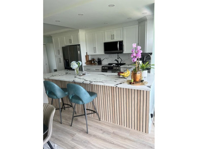 Beautifully renovated 2/2 condo with stunning views of the Coral on Coral Ridge Country Club in Florida - for sale on GolfHomes.com, golf home, golf lot