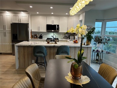 Beautifully renovated 2/2 condo with stunning views of the Coral on Coral Ridge Country Club in Florida - for sale on GolfHomes.com, golf home, golf lot