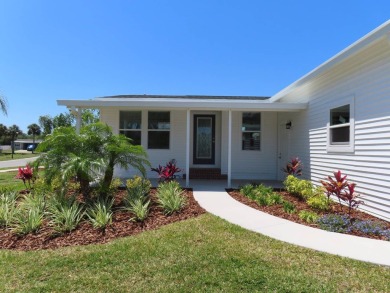 This never owned new Palm Harbor Black Diamond model is ready on Crane Lakes Golf and Country Club in Florida - for sale on GolfHomes.com, golf home, golf lot