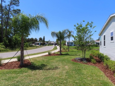 This never owned new Palm Harbor Black Diamond model is ready on Crane Lakes Golf and Country Club in Florida - for sale on GolfHomes.com, golf home, golf lot