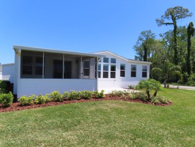 This never owned new Palm Harbor Black Diamond model is ready on Crane Lakes Golf and Country Club in Florida - for sale on GolfHomes.com, golf home, golf lot