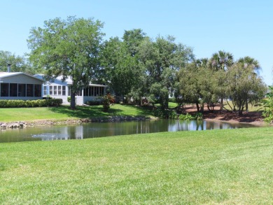 This never owned new Palm Harbor Black Diamond model is ready on Crane Lakes Golf and Country Club in Florida - for sale on GolfHomes.com, golf home, golf lot