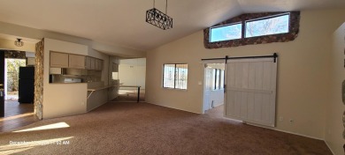 Discover this lovely 2-bedroom (possible 3 bedroom), 2-bathroom on Tierra Del Sol Golf Course in New Mexico - for sale on GolfHomes.com, golf home, golf lot