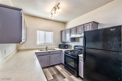 Updated 2-bedroom, 2-bath first-floor corner condo in the gated on Desert Rose Golf Course in Nevada - for sale on GolfHomes.com, golf home, golf lot