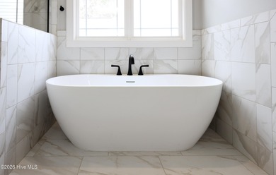 Over 3,000 sqft of refined living in a gated golf community on Woodlake Country Club in North Carolina - for sale on GolfHomes.com, golf home, golf lot