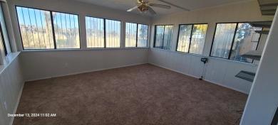 Discover this lovely 2-bedroom (possible 3 bedroom), 2-bathroom on Tierra Del Sol Golf Course in New Mexico - for sale on GolfHomes.com, golf home, golf lot