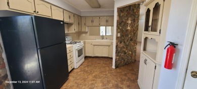 Discover this lovely 2-bedroom (possible 3 bedroom), 2-bathroom on Tierra Del Sol Golf Course in New Mexico - for sale on GolfHomes.com, golf home, golf lot