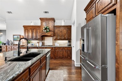 Exceptional one-story Paul Taylor home on an oversized corner on Gentle Creek Golf Club in Texas - for sale on GolfHomes.com, golf home, golf lot