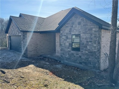 Come see this beautiful Spec/New construction home in Pea Ridge on Big Sugar Golf Club in Arkansas - for sale on GolfHomes.com, golf home, golf lot