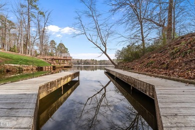 Gorgeous Lakefront estate! From the moment you enter, you're on River Golf and Country Club at Lake Royale in North Carolina - for sale on GolfHomes.com, golf home, golf lot