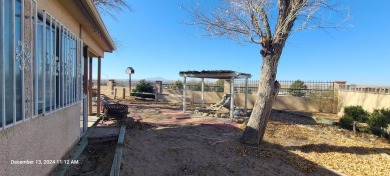 Discover this lovely 2-bedroom (possible 3 bedroom), 2-bathroom on Tierra Del Sol Golf Course in New Mexico - for sale on GolfHomes.com, golf home, golf lot