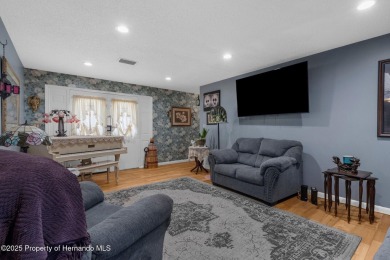 Welcome to this beautifully maintained 3-bedroom, 2-bath home on Oak Hills Country Club in Florida - for sale on GolfHomes.com, golf home, golf lot