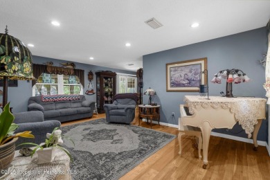 Welcome to this beautifully maintained 3-bedroom, 2-bath home on Oak Hills Country Club in Florida - for sale on GolfHomes.com, golf home, golf lot