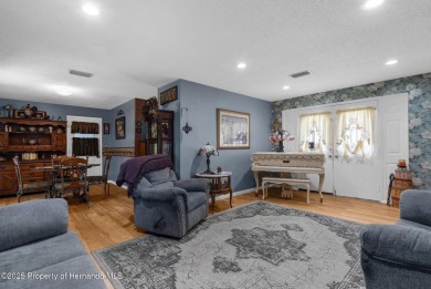 Welcome to this beautifully maintained 3-bedroom, 2-bath home on Oak Hills Country Club in Florida - for sale on GolfHomes.com, golf home, golf lot