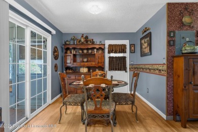 Welcome to this beautifully maintained 3-bedroom, 2-bath home on Oak Hills Country Club in Florida - for sale on GolfHomes.com, golf home, golf lot
