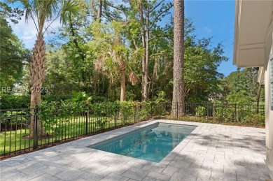 Coastal elegance meets breathtaking golf views in this stunning on Dolphin Head Golf Club in South Carolina - for sale on GolfHomes.com, golf home, golf lot