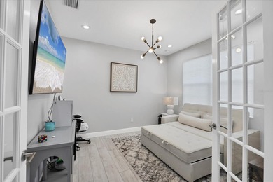 Located in the gated waterfront community of Legends Bay and on IMG Academies Golf and Country Club in Florida - for sale on GolfHomes.com, golf home, golf lot