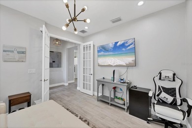 Located in the gated waterfront community of Legends Bay and on IMG Academies Golf and Country Club in Florida - for sale on GolfHomes.com, golf home, golf lot