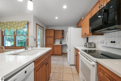 Located just blocks from Lake Michigan and adjacent to Manistee on Manistee Golf and Country Club in Michigan - for sale on GolfHomes.com, golf home, golf lot