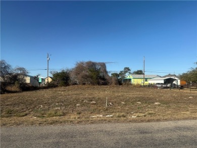 This double lot in the quiet Holiday Beach community offers the on Lamar Golf Course in Texas - for sale on GolfHomes.com, golf home, golf lot