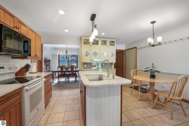 Located just blocks from Lake Michigan and adjacent to Manistee on Manistee Golf and Country Club in Michigan - for sale on GolfHomes.com, golf home, golf lot