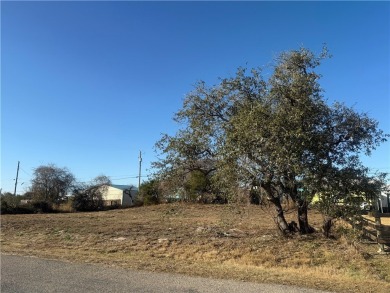 This double lot in the quiet Holiday Beach community offers the on Lamar Golf Course in Texas - for sale on GolfHomes.com, golf home, golf lot