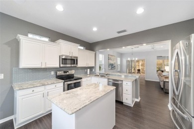 This stunning Coral Gables model was remodeled in 2021-2022 on Eagle Ridge At Spruce Creek Country Club in Florida - for sale on GolfHomes.com, golf home, golf lot