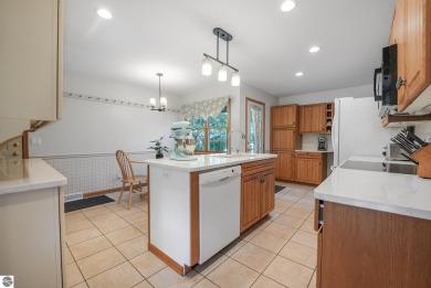 Located just blocks from Lake Michigan and adjacent to Manistee on Manistee Golf and Country Club in Michigan - for sale on GolfHomes.com, golf home, golf lot