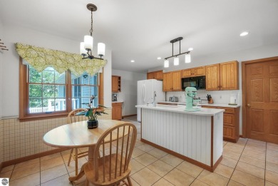 Located just blocks from Lake Michigan and adjacent to Manistee on Manistee Golf and Country Club in Michigan - for sale on GolfHomes.com, golf home, golf lot