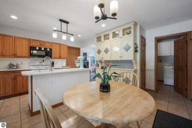 Located just blocks from Lake Michigan and adjacent to Manistee on Manistee Golf and Country Club in Michigan - for sale on GolfHomes.com, golf home, golf lot